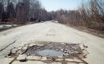 Путин потребовал улучшения местных дорог 